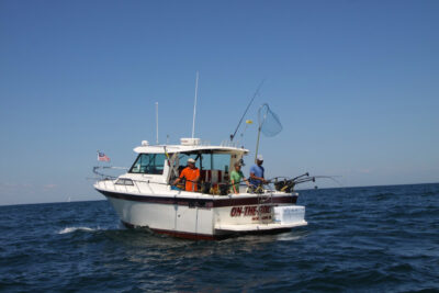 people on a boat fishing