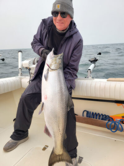 a man holding a big fish
